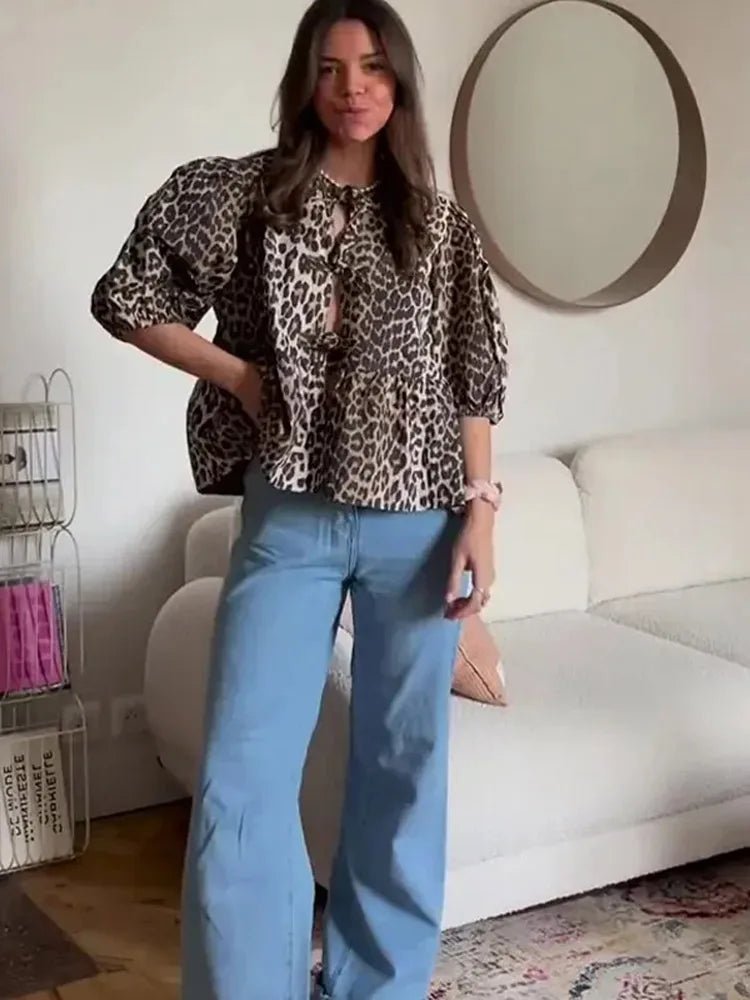 Bluse mit Leopardenmuster, Puffärmel und Schleifenakzent - Livezo