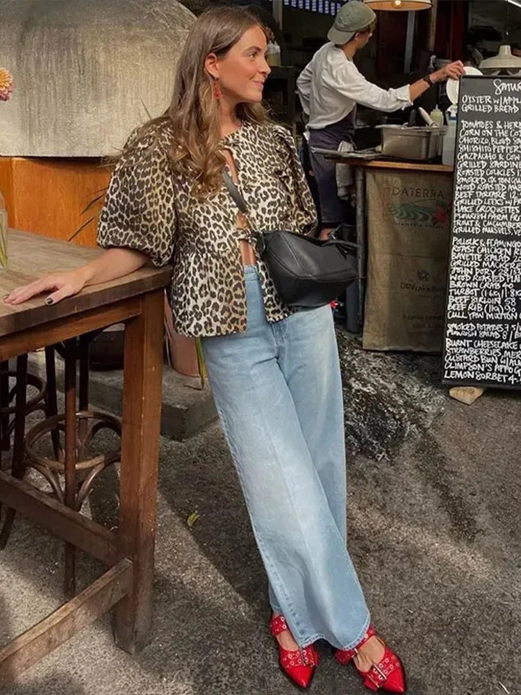 Bluse mit Leopardenmuster, Puffärmel und Schleifenakzent - Livezo